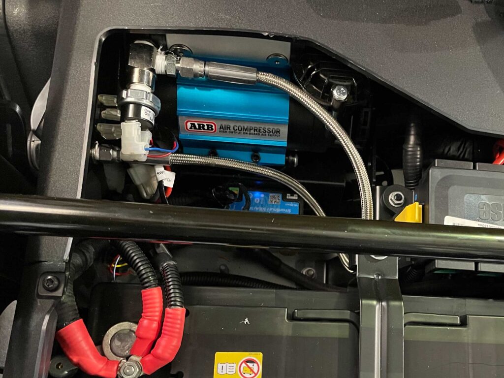 ARB Air Compressor installation under the seat of Ineos Grenadier