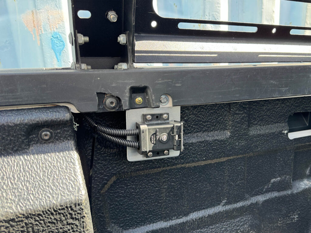 Grey 50A Anderson Plug installed in the rear tub using a Trailer Vision housing and custom bracket