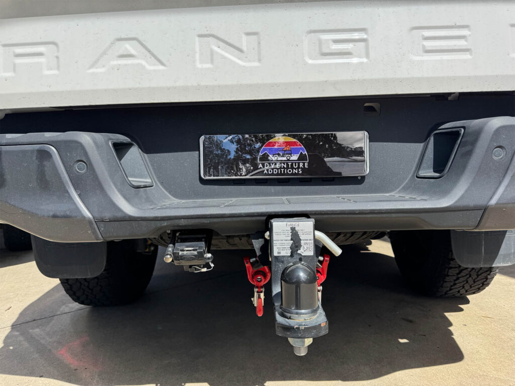 A 50A Anderson plug provides a secure power connection for trailers, managed by the voltage-sensitive relay