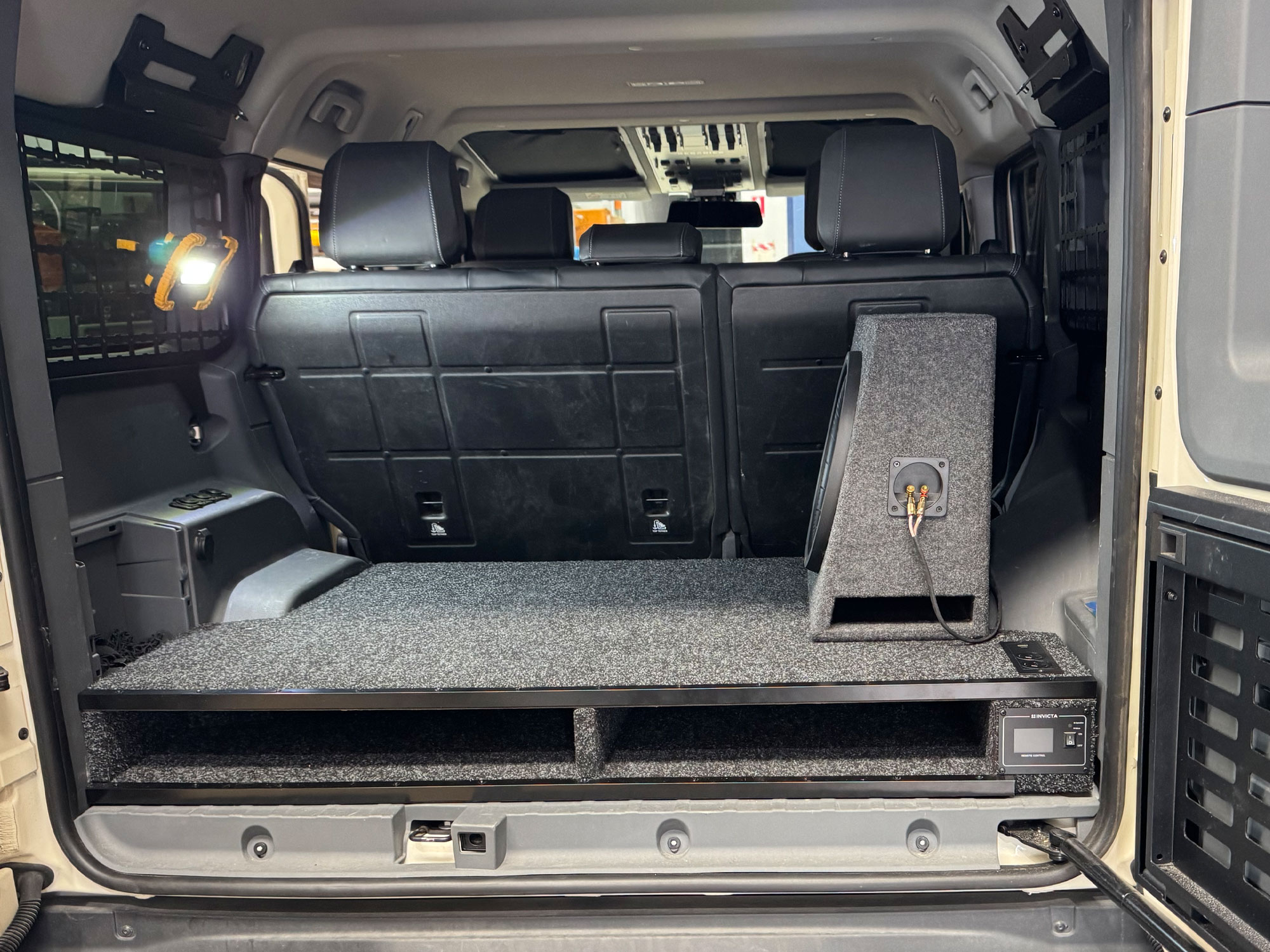 Vehicles receiving a premium speaker upgrade alongside custom cargo or storage fitouts