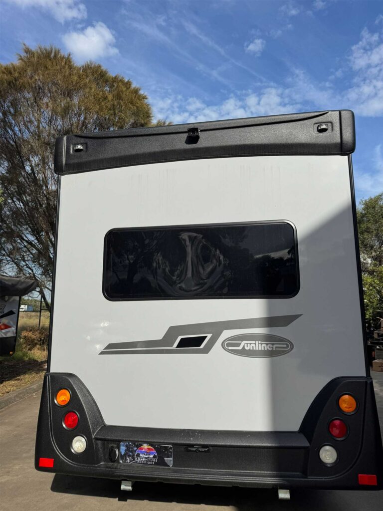 Lower rear profile highlighting license plate camera position