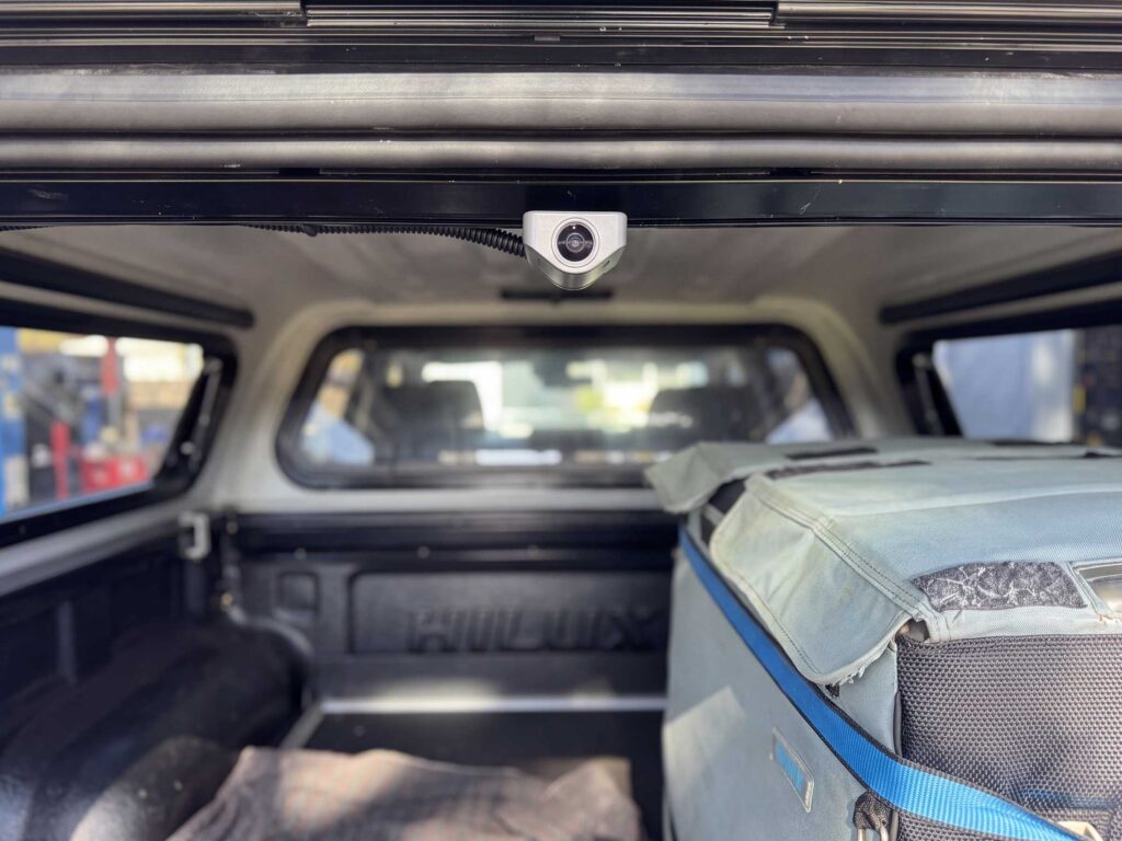 The rear high-definition camera is mounted neatly on the upper inside of the canopy frame, with the cable protected by a conduit