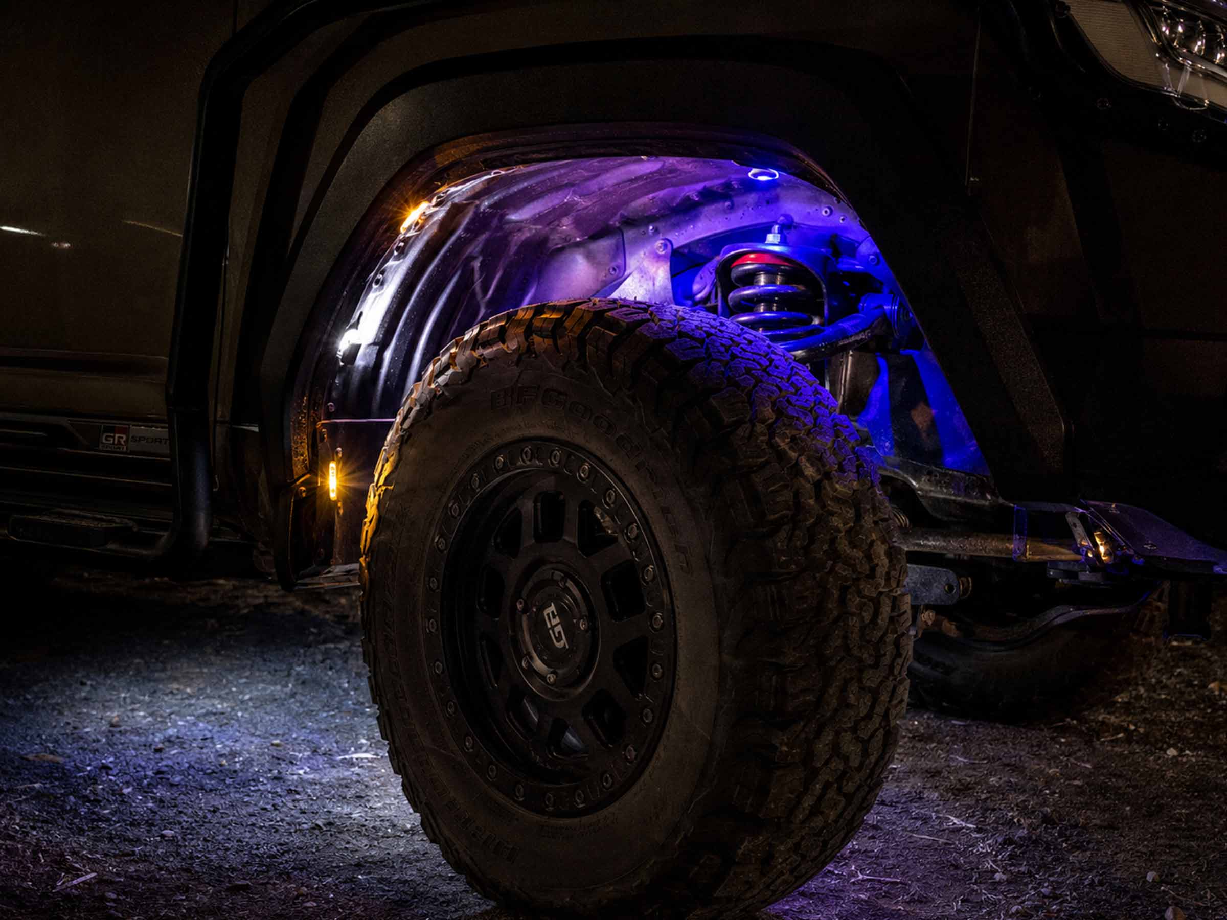 Multi-colour or single-colour LED pods mounted near each wheel